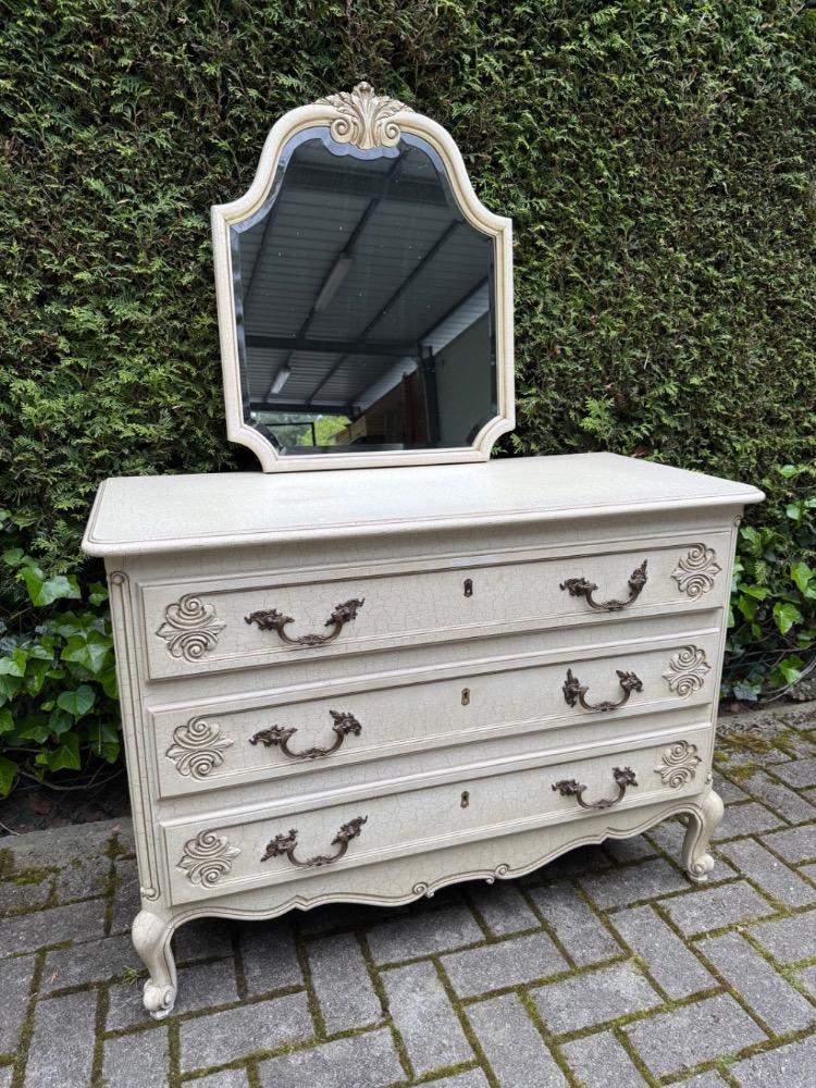 Chest of drawers and mirror