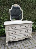 Chest of drawers and mirror
