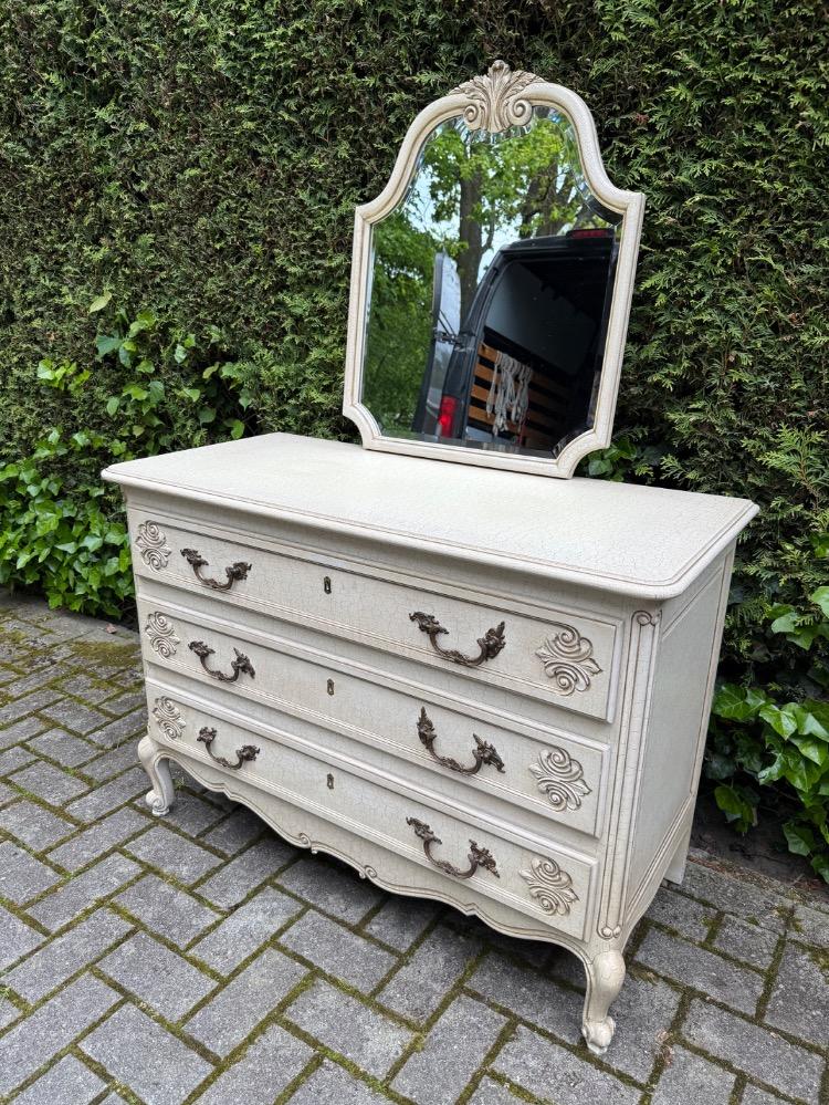 Chest of drawers and mirror