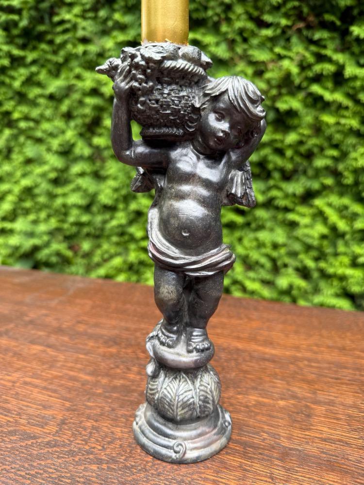 Rococo style Pair of candle holders.