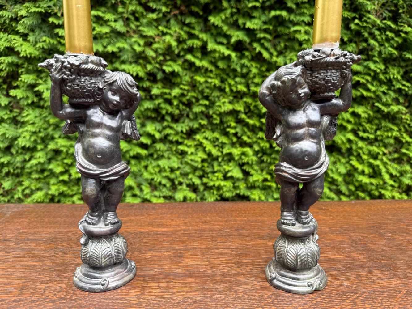 Rococo style Pair of candle holders.