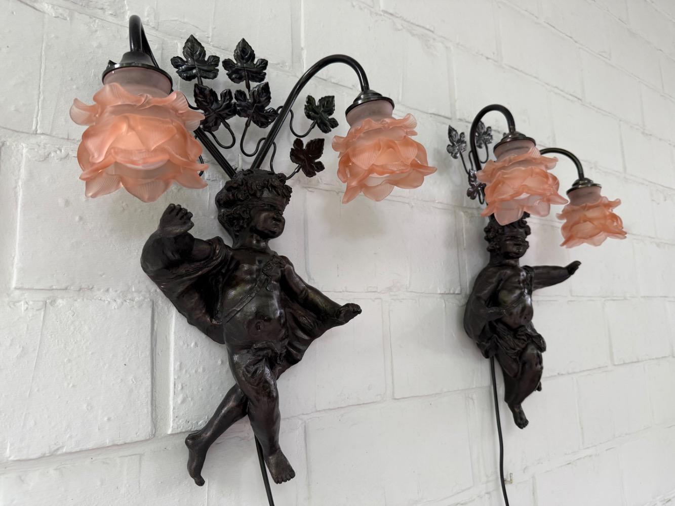 Rococo style Pair of wall lights.