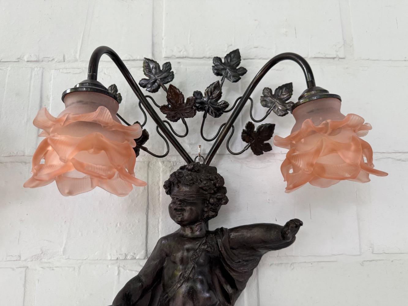 Rococo style Pair of wall lights.