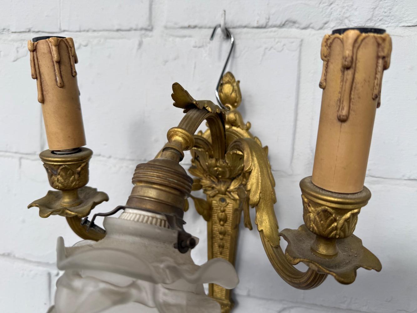 Rococo style Pair of wall lights.